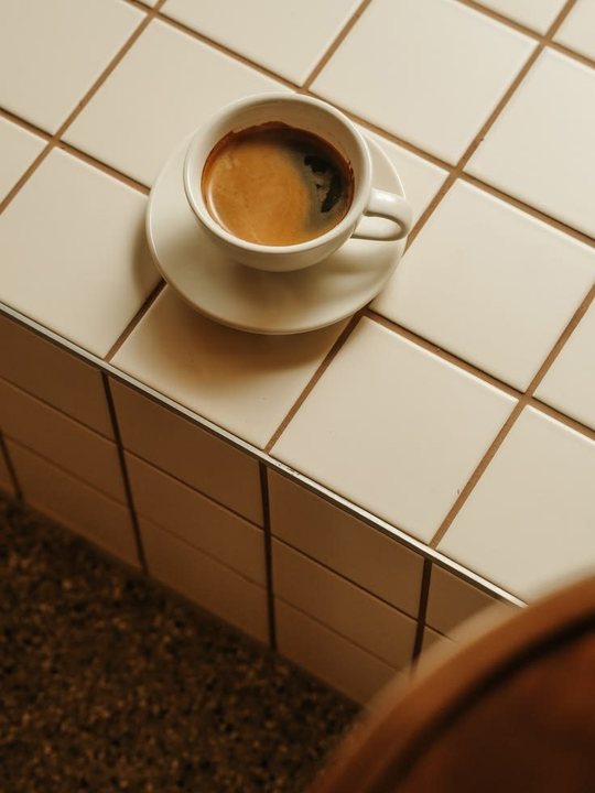 Cream · espresso on tile (reference)